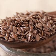 Bulk Flax Seeds On A Spoon